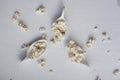 White spoon with popcorn. Royalty Free Stock Photo