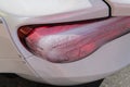 White sports car closeup. Condensation in taillights.