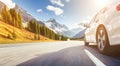 White sports car drives along a beautiful mountain road while traveling through Europe Royalty Free Stock Photo