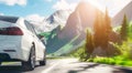 White sports car drives along a beautiful mountain road while traveling through Europe Royalty Free Stock Photo