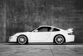 White Porsche Carrera sports car indoors Royalty Free Stock Photo