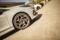 White Sports Car Parked on Side of Road