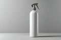 White spray bottle placed on a gray surface with a simple and clean design suitable for various uses Royalty Free Stock Photo