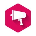 White Spread the word, megaphone icon isolated with long shadow. Pink hexagon button. Vector Illustration