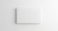A white square object on a white surface Royalty Free Stock Photo