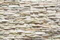 White Stacked slabs Stone wall cladding panels. Royalty Free Stock Photo