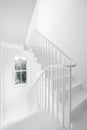 White staircase landing