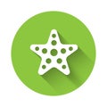 White Starfish icon isolated with long shadow. Green circle button. Vector Royalty Free Stock Photo