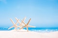 White starfish with ocean, on white sand beach, sky and seascape Royalty Free Stock Photo