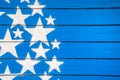 White stars on blue background painted on a closed shutter