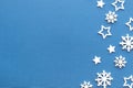 Christmas background.Snowflakes and stars on navy blue background. Royalty Free Stock Photo