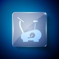 White Stationary bicycle icon isolated on blue background. Exercise bike. Square glass panels. Vector