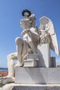 White statue above Praca do Comercio in Lisbon