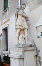 White statue and castle in Castelfranco Veneto, in Italy Royalty Free Stock Photo