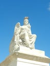 White statue in courtyard of Louvre Museum in the sunny day. Paris.