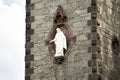 White statue jesus god on tower of Chiesa evangelica di Cristo church in Merano, Italy