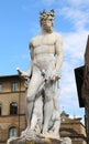 White statue of Neptune in the ancient fountain in Florence Royalty Free Stock Photo