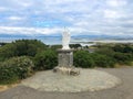 White statue of Saint Patrick at the start of foot path to the peak of Croagh Patrick, county Mayo, Ireland Royalty Free Stock Photo