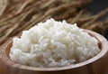 White steamed rice in wooden bowl