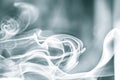 White and steel blue abstract background - Trail of smoke on a dark background - creative colour effects with smoke smudges Royalty Free Stock Photo
