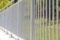 White steel fence railing