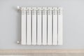 White steel heating radiator on the wall Royalty Free Stock Photo