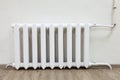 White steel radiator of central heating in room Royalty Free Stock Photo