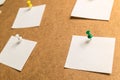 White stickers for notes on a cardboard background