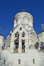 The white-stone bell tower of the Church of the Beheading of the Head of John the Baptist in Dyakov Moskovsky