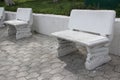 White stone benches