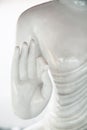 White stone Buddha statue hand gesture close-up. Asian symbolic Royalty Free Stock Photo