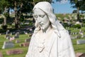 Sacred Heart of Jesus cemetery stature closeup white stone Royalty Free Stock Photo