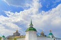 White-stone Church on the mountain against the blue sky with clouds, Golden domes, Royalty Free Stock Photo