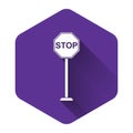 White Stop icon isolated with long shadow. Traffic regulatory warning stop symbol. Purple hexagon button