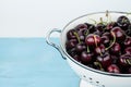 White strainer with cherries Royalty Free Stock Photo