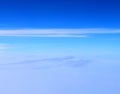 White Stratiform Clouds In Infinite Sky with Shades of Blue - Aerial View - Abstract Natural Background Royalty Free Stock Photo