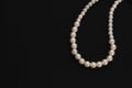 White String Pearls necklace, isolated on black Copy space Royalty Free Stock Photo