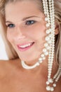 White strong teeth and pearls Royalty Free Stock Photo