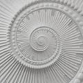 White stucco moulding plasterwork spiral abstract fractal pattern background. Plaster abstract spiral effect background elements Royalty Free Stock Photo