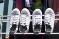 White student sneakers that are washed and dry.
