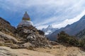 White stupa and Ama Dablam mountain peak, Everest region, Nepal Royalty Free Stock Photo