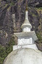 White Stupa sacred mountain Adam`s Peak in Sri Lanka