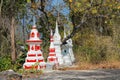 White and red stupa in Buddhist wat temple in Thailand