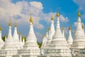 White stupas of the Sanda Muni pagoda. Mandalay Royalty Free Stock Photo