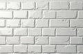 White subway tile wall close up. Rectangular tiles form a classic brick pattern with slightly distressed edges and grout lines. Royalty Free Stock Photo