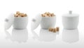 White sugar bowl and brown sugar cubes