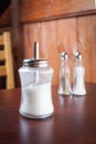 Sugar container on brown table Royalty Free Stock Photo