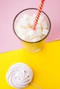 White sugar cubes in a glass with tubule