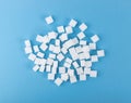 White Sugar Cubes Isolated on Blue Background Royalty Free Stock Photo