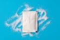 White Sugar Packets on a Blue background